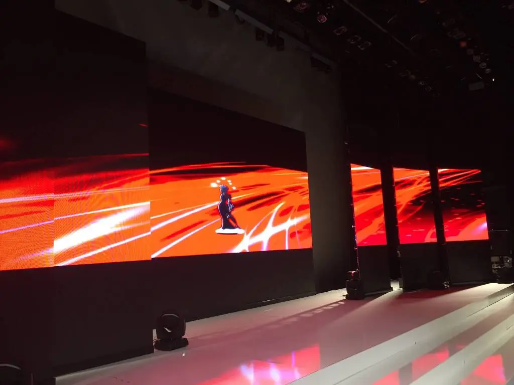 video wall behind stage with sound system